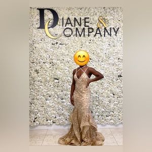 Gold and sequin formal gown.